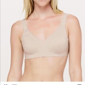 Lululemon no-wire bra.Never worn, tags still on! Size 38DD. Beige color